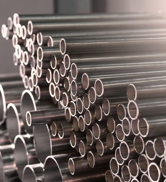 Stainless,Steel,Pipes,In,An,Industrial,Warehouse