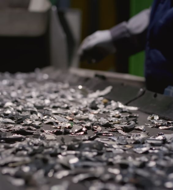 Worker,Sorts,Trash,On,Conveyor,Belt,At,Waste,Recycling,Plant.