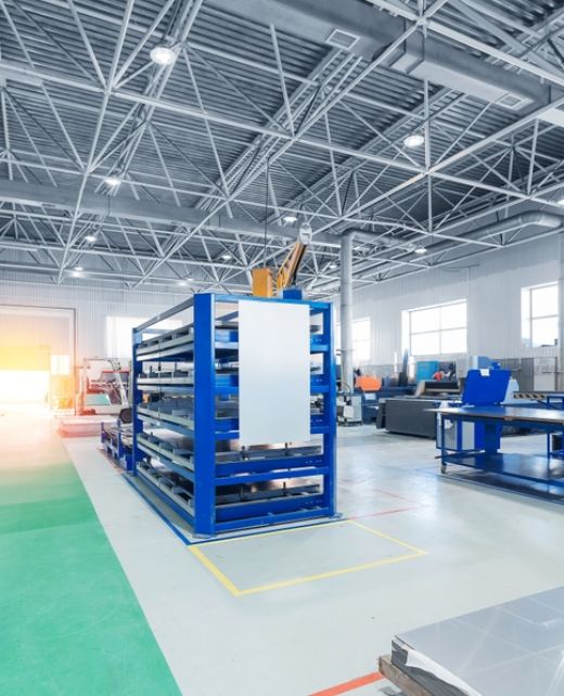 Modern,Industrial,Factory,Interior,With,Machinery,And,Storage,Racks.