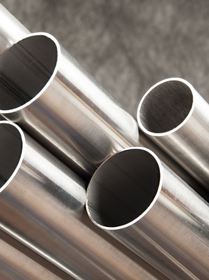 Steel,Pipes,On,Grey,Background